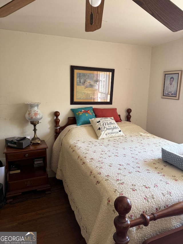 bedroom featuring dark hardwood / wood-style floors