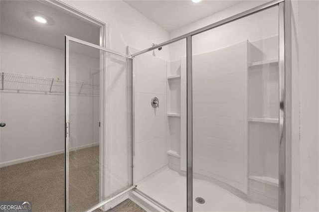 bathroom with an enclosed shower