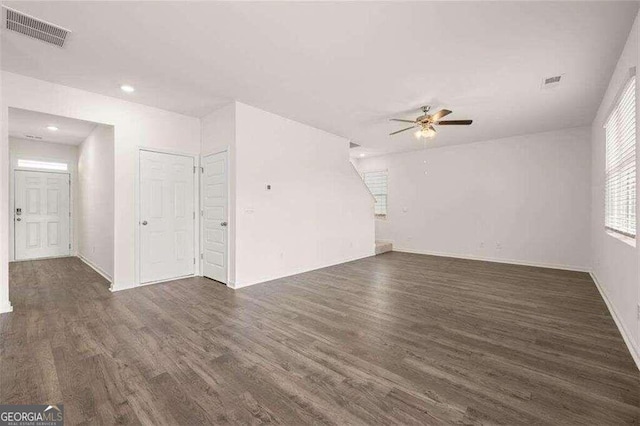 interior space featuring dark hardwood / wood-style floors and ceiling fan