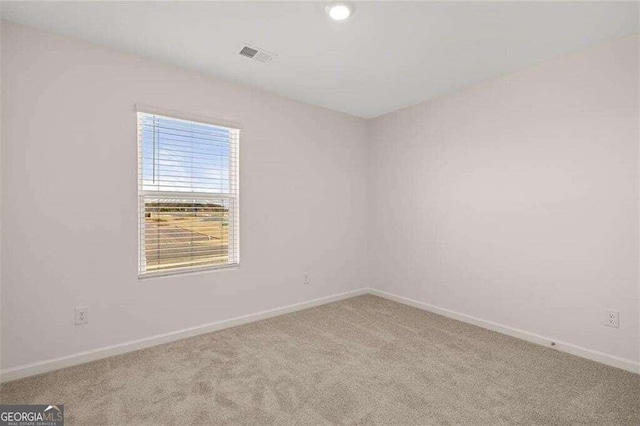 view of carpeted spare room