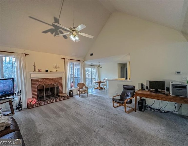 home office featuring ceiling fan, carpet flooring, high vaulted ceiling, and a brick fireplace