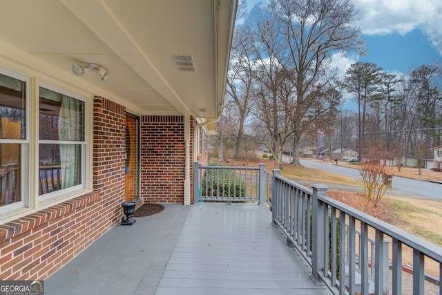 balcony featuring a porch