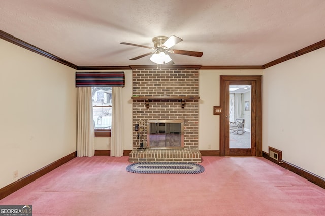 unfurnished living room featuring a brick fireplace, a textured ceiling, and carpet flooring