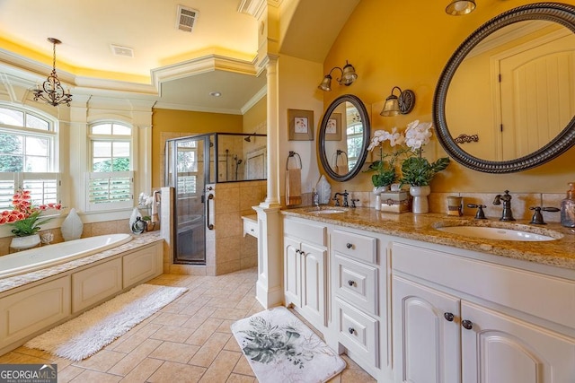 bathroom featuring vanity, ornamental molding, shower with separate bathtub, and ornate columns