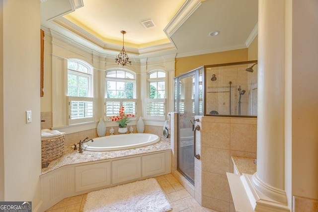 bathroom with tile patterned flooring, crown molding, a healthy amount of sunlight, and separate shower and tub