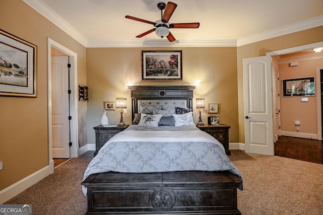 bedroom featuring crown molding, ceiling fan, and dark carpet