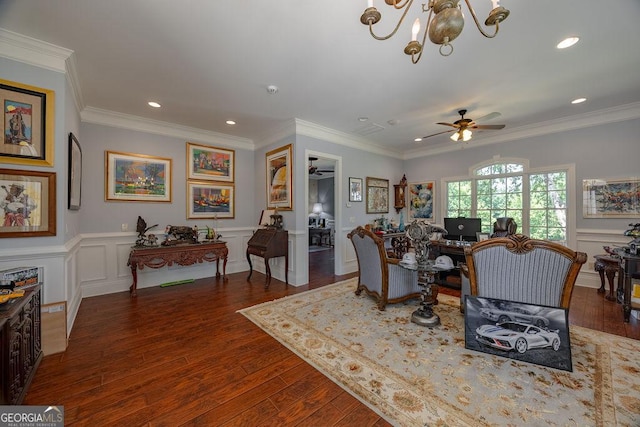 living room featuring crown molding, dark hardwood / wood-style floors, and ceiling fan with notable chandelier