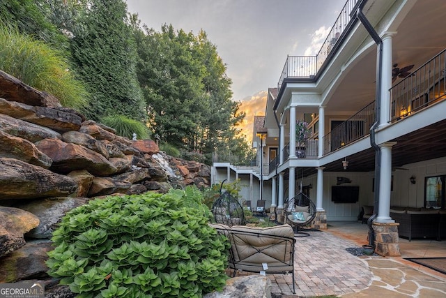 view of home's community with a patio