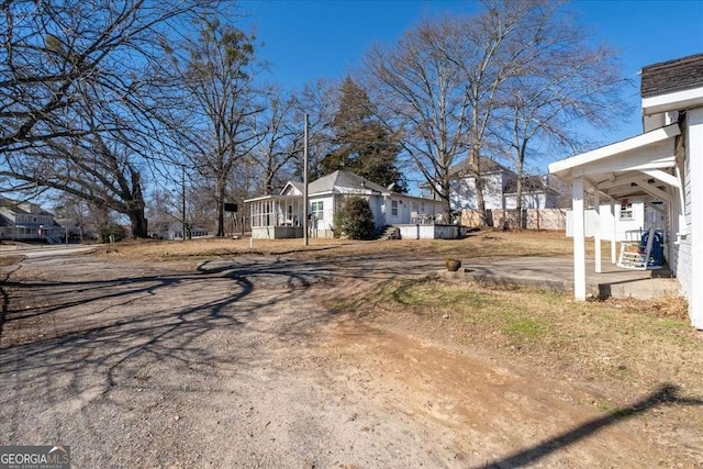 view of yard with a sunroom