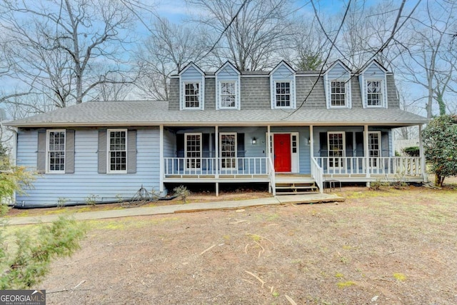 cape cod house with a porch