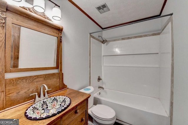 full bathroom featuring shower / bathtub combination, ornamental molding, vanity, toilet, and a textured ceiling