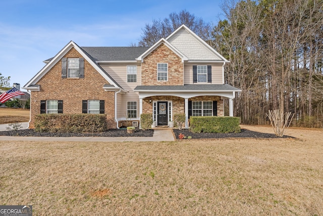 view of front facade with a front lawn