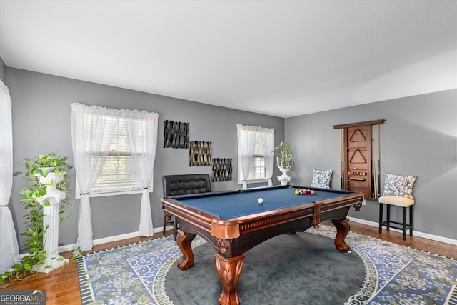 rec room with hardwood / wood-style floors and billiards