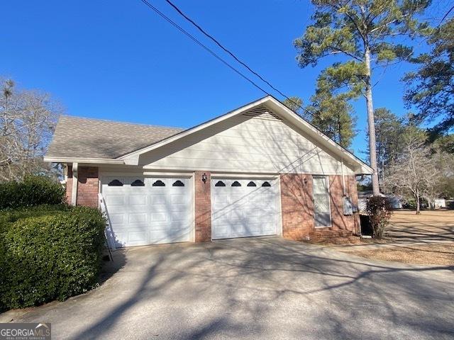 view of home's exterior with a garage