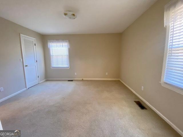 interior space with light colored carpet