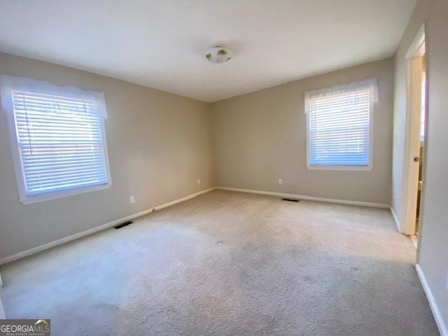 view of carpeted spare room