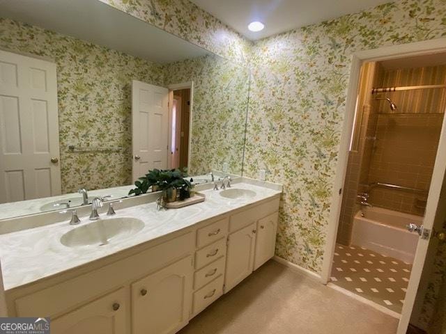 bathroom with vanity and bathing tub / shower combination