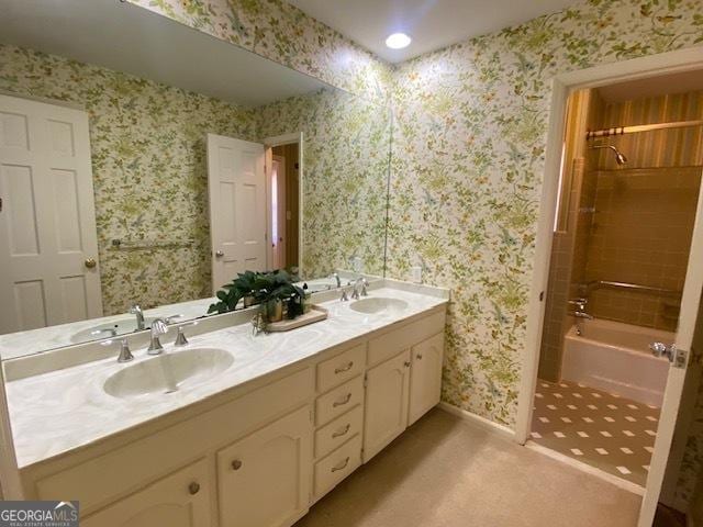 bathroom featuring vanity and shower / bathing tub combination