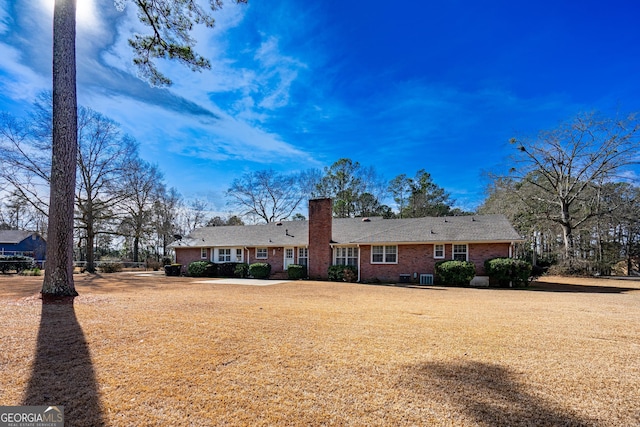 exterior space with a lawn