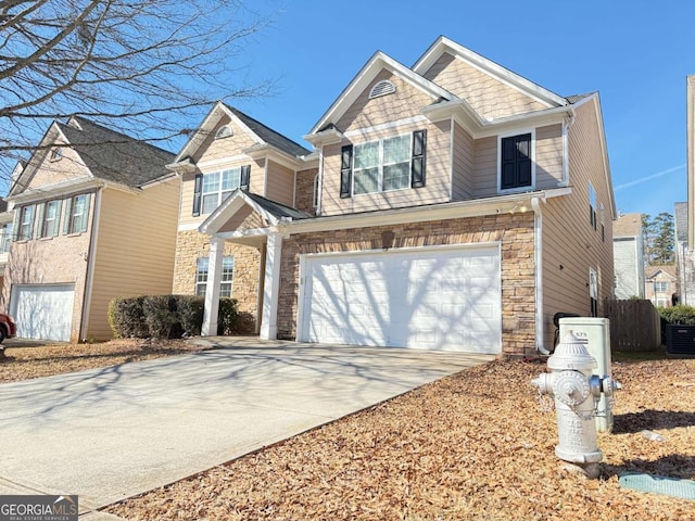 craftsman-style home with a garage