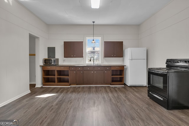 kitchen featuring pendant lighting, sink, electric range, dark brown cabinets, and white refrigerator