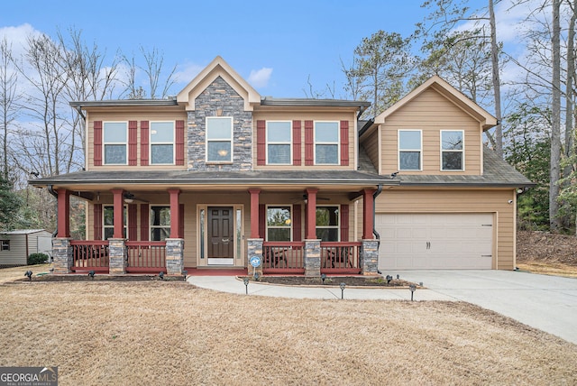 craftsman house with a garage and covered porch