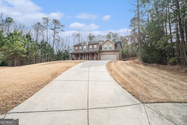 view of front of property featuring a garage