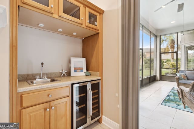 bar featuring wine cooler, light tile patterned flooring, and sink