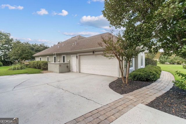 view of home's exterior featuring a garage