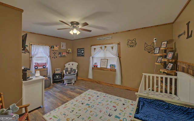 bedroom featuring hardwood / wood-style flooring and ornamental molding