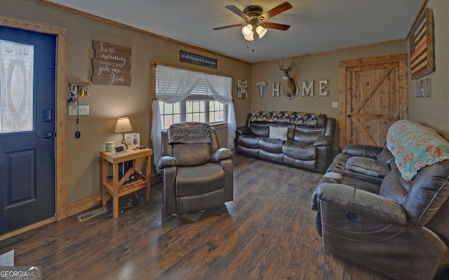 living room featuring ornamental molding, ceiling fan, and dark hardwood / wood-style flooring