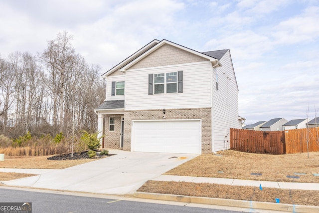 view of front of home with a garage