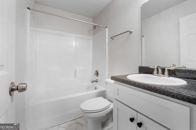 full bathroom with vanity, shower / tub combination, and toilet