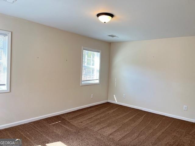 view of carpeted spare room