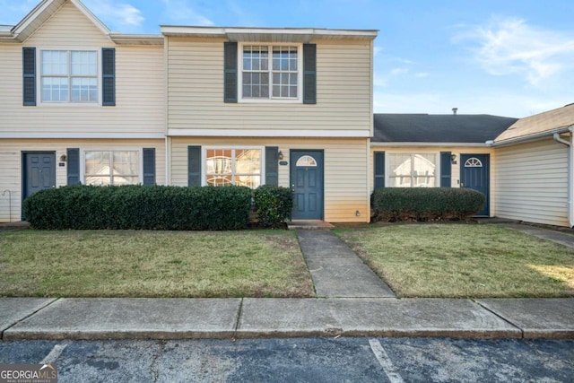 view of front of home featuring a front yard