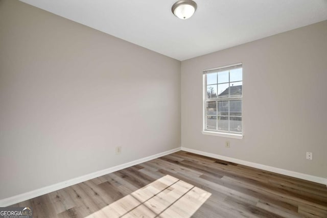 empty room featuring light hardwood / wood-style flooring