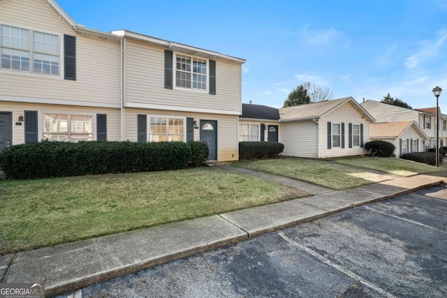 view of front of house with a front lawn