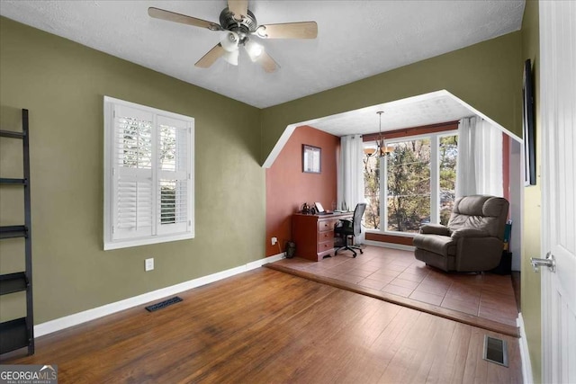 office area featuring ceiling fan and hardwood / wood-style floors