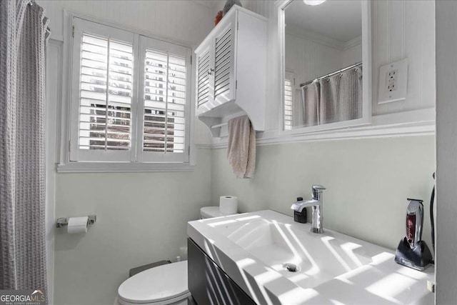 bathroom with vanity and toilet