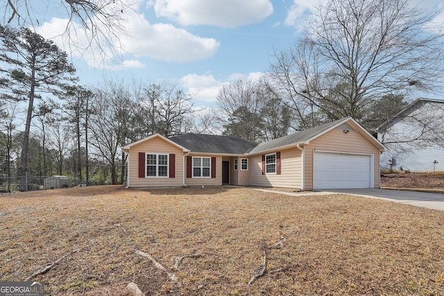 ranch-style home with a garage