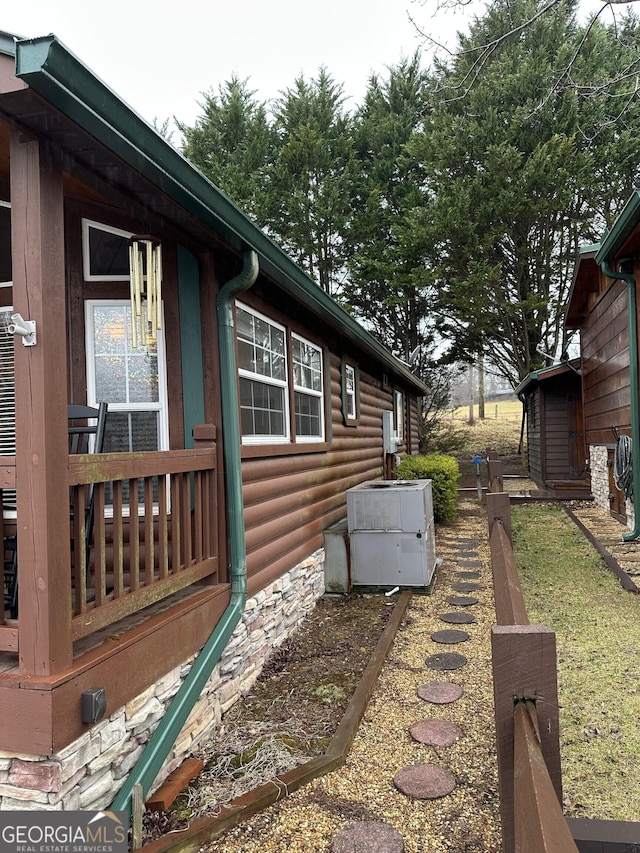 view of home's exterior featuring cooling unit