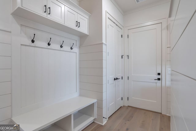 mudroom with light wood-type flooring