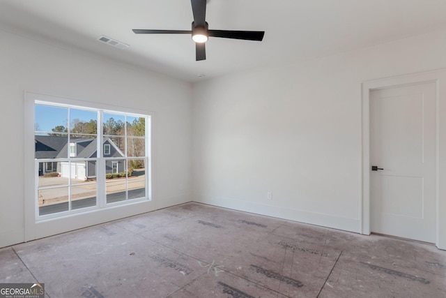 spare room with ceiling fan