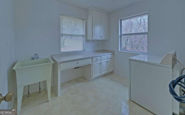 washroom with washer / clothes dryer