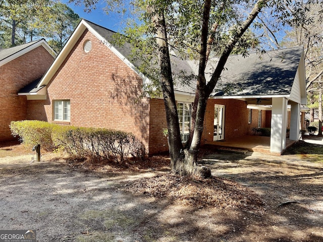 view of home's exterior featuring brick siding