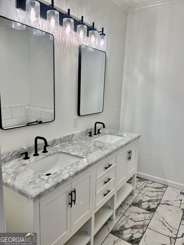 bathroom with double vanity, marble finish floor, baseboards, and a sink