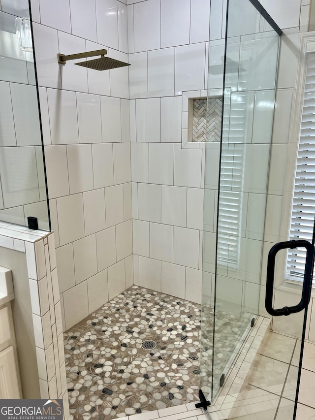 bathroom with a stall shower