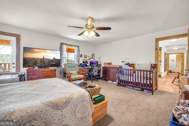 carpeted bedroom with ceiling fan