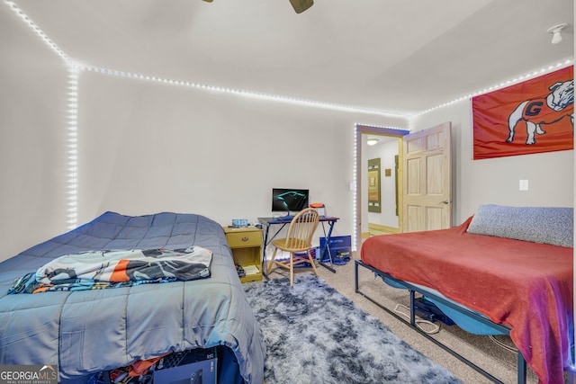 carpeted bedroom with ceiling fan