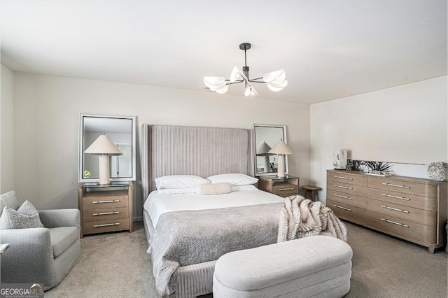 bedroom with an inviting chandelier and light carpet